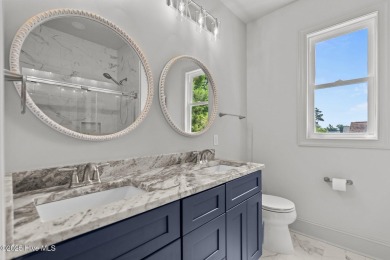 Coastal Luxury Meets Livability at 1552 Windsong Drive in Ocean on Brick Landing Plantation Yacht and Golf Club in North Carolina - for sale on GolfHomes.com, golf home, golf lot
