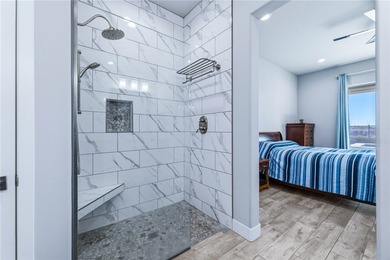 Experience modern resort living in this newer 2024 home, located on Laughlin Ranch Golf Club in Arizona - for sale on GolfHomes.com, golf home, golf lot