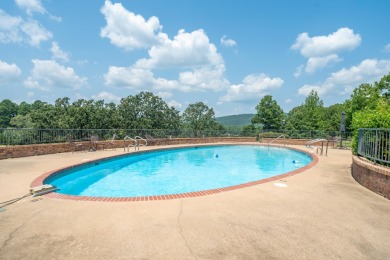 he stunning timeless architecture of these condominiums on Belvedere Golf Club in Arkansas - for sale on GolfHomes.com, golf home, golf lot