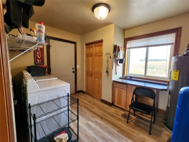 Located just outside Fairfield, Montana, this beautiful home on Harvest Hills Golf Course in Montana - for sale on GolfHomes.com, golf home, golf lot