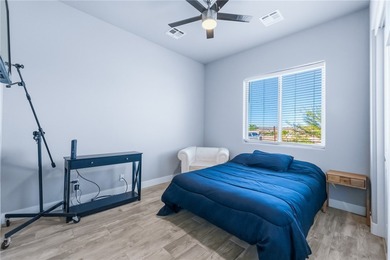 Experience modern resort living in this newer 2024 home, located on Laughlin Ranch Golf Club in Arizona - for sale on GolfHomes.com, golf home, golf lot