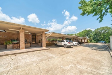 he stunning timeless architecture of these condominiums on Belvedere Golf Club in Arkansas - for sale on GolfHomes.com, golf home, golf lot
