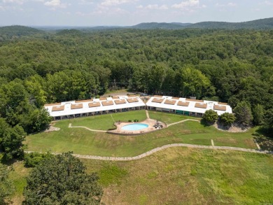 he stunning timeless architecture of these condominiums on Belvedere Golf Club in Arkansas - for sale on GolfHomes.com, golf home, golf lot