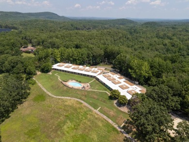 he stunning timeless architecture of these condominiums on Belvedere Golf Club in Arkansas - for sale on GolfHomes.com, golf home, golf lot