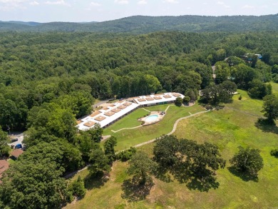 he stunning timeless architecture of these condominiums on Belvedere Golf Club in Arkansas - for sale on GolfHomes.com, golf home, golf lot