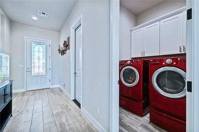 Experience modern resort living in this newer 2024 home, located on Laughlin Ranch Golf Club in Arizona - for sale on GolfHomes.com, golf home, golf lot