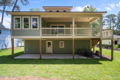 Coastal Luxury Meets Livability at 1552 Windsong Drive in Ocean on Brick Landing Plantation Yacht and Golf Club in North Carolina - for sale on GolfHomes.com, golf home, golf lot