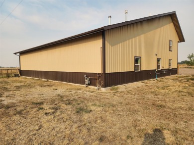 Located just outside Fairfield, Montana, this beautiful home on Harvest Hills Golf Course in Montana - for sale on GolfHomes.com, golf home, golf lot