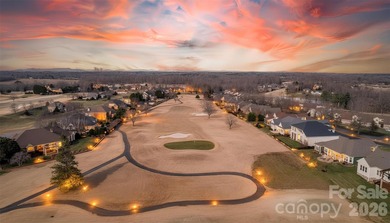 Welcome to the ease and elegance of true golf course living on Rock Barn Golf and Spa in North Carolina - for sale on GolfHomes.com, golf home, golf lot