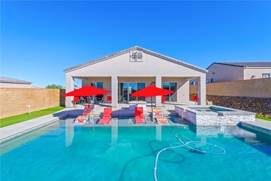 Experience modern resort living in this newer 2024 home, located on Laughlin Ranch Golf Club in Arizona - for sale on GolfHomes.com, golf home, golf lot
