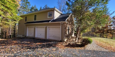 Tucked away on over an acre of wooded privacy, this 5-bedroom on Great Bear Golf and Country Club in Pennsylvania - for sale on GolfHomes.com, golf home, golf lot