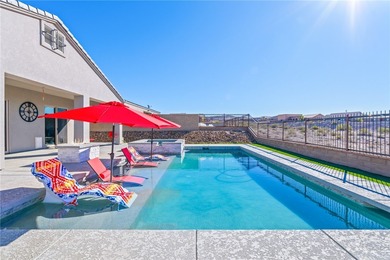 Experience modern resort living in this newer 2024 home, located on Laughlin Ranch Golf Club in Arizona - for sale on GolfHomes.com, golf home, golf lot