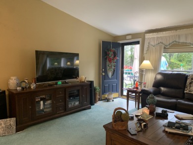 You'll enjoy the quality, 6' walls and workmanship of the lovely on Lost Lake Woods Club in Michigan - for sale on GolfHomes.com, golf home, golf lot