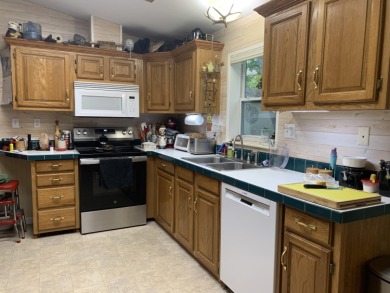 You'll enjoy the quality, 6' walls and workmanship of the lovely on Lost Lake Woods Club in Michigan - for sale on GolfHomes.com, golf home, golf lot