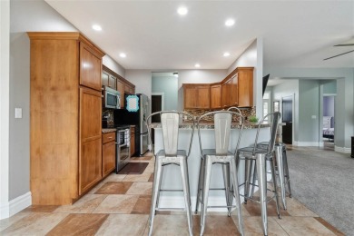 Nestled within an exclusive golf course community, this stunning on Hillcrest Country Club in Iowa - for sale on GolfHomes.com, golf home, golf lot
