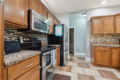 Nestled within an exclusive golf course community, this stunning on Hillcrest Country Club in Iowa - for sale on GolfHomes.com, golf home, golf lot
