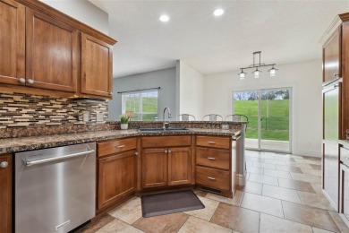 Nestled within an exclusive golf course community, this stunning on Hillcrest Country Club in Iowa - for sale on GolfHomes.com, golf home, golf lot