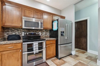 Nestled within an exclusive golf course community, this stunning on Hillcrest Country Club in Iowa - for sale on GolfHomes.com, golf home, golf lot