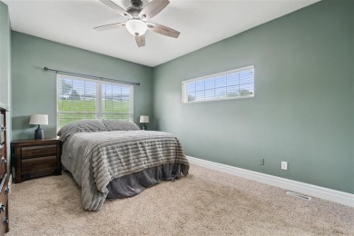 Nestled within an exclusive golf course community, this stunning on Hillcrest Country Club in Iowa - for sale on GolfHomes.com, golf home, golf lot