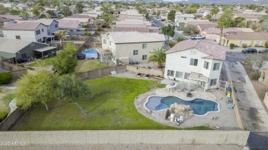 Located in Johnson Ranch community, this stunning two-story home on The Golf Club At Johnson Ranch in Arizona - for sale on GolfHomes.com, golf home, golf lot