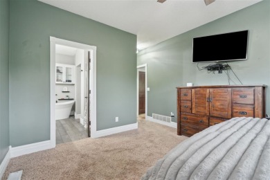 Nestled within an exclusive golf course community, this stunning on Hillcrest Country Club in Iowa - for sale on GolfHomes.com, golf home, golf lot