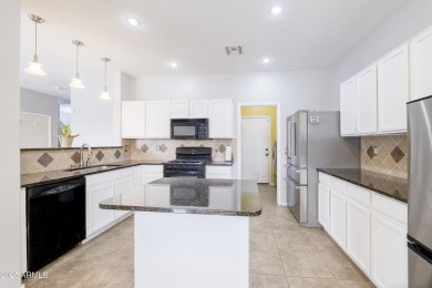 Located in Johnson Ranch community, this stunning two-story home on The Golf Club At Johnson Ranch in Arizona - for sale on GolfHomes.com, golf home, golf lot