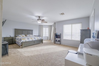 Located in Johnson Ranch community, this stunning two-story home on The Golf Club At Johnson Ranch in Arizona - for sale on GolfHomes.com, golf home, golf lot