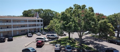 Welcome home to your beautifully updated top floor END unit on On Top Of The World Golf Course in Florida - for sale on GolfHomes.com, golf home, golf lot