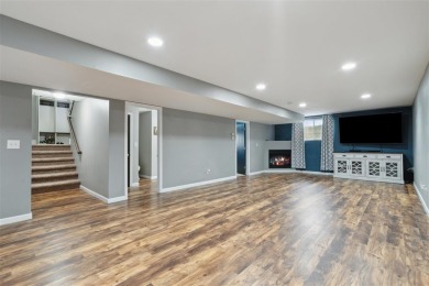 Nestled within an exclusive golf course community, this stunning on Hillcrest Country Club in Iowa - for sale on GolfHomes.com, golf home, golf lot