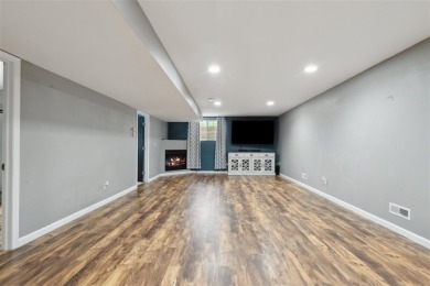 Nestled within an exclusive golf course community, this stunning on Hillcrest Country Club in Iowa - for sale on GolfHomes.com, golf home, golf lot