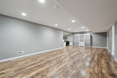Nestled within an exclusive golf course community, this stunning on Hillcrest Country Club in Iowa - for sale on GolfHomes.com, golf home, golf lot