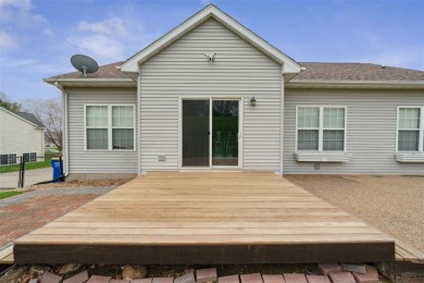 Nestled within an exclusive golf course community, this stunning on Hillcrest Country Club in Iowa - for sale on GolfHomes.com, golf home, golf lot