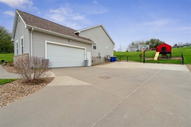 Nestled within an exclusive golf course community, this stunning on Hillcrest Country Club in Iowa - for sale on GolfHomes.com, golf home, golf lot