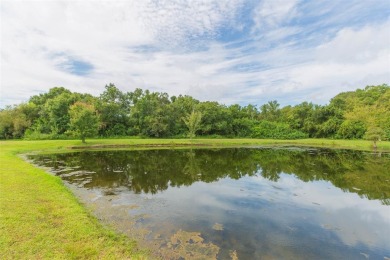 Waterfront POND lot with stunning water views! This 2-bedroom on Caloosa Greens Executive Golf Course in Florida - for sale on GolfHomes.com, golf home, golf lot