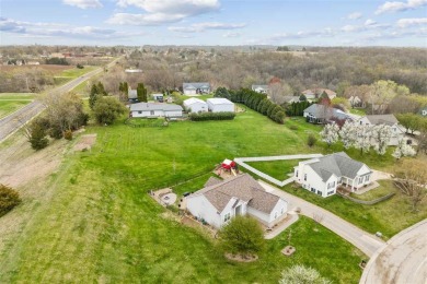 Nestled within an exclusive golf course community, this stunning on Hillcrest Country Club in Iowa - for sale on GolfHomes.com, golf home, golf lot