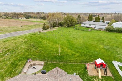 Nestled within an exclusive golf course community, this stunning on Hillcrest Country Club in Iowa - for sale on GolfHomes.com, golf home, golf lot