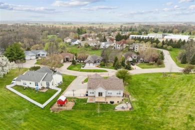 Nestled within an exclusive golf course community, this stunning on Hillcrest Country Club in Iowa - for sale on GolfHomes.com, golf home, golf lot