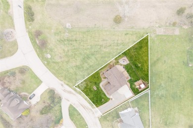 Nestled within an exclusive golf course community, this stunning on Hillcrest Country Club in Iowa - for sale on GolfHomes.com, golf home, golf lot