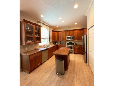 Nestled on a quiet cul-de-sac in the highly sought-after on The Golf Club of Jupiter in Florida - for sale on GolfHomes.com, golf home, golf lot