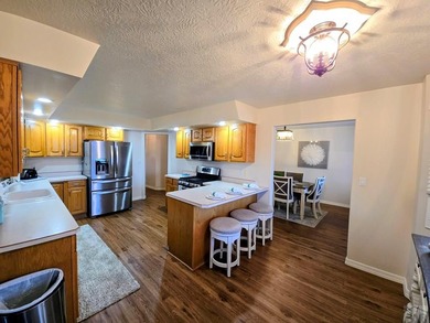 Beautiful, spacious home located at the 7th and 8th hole of on Desert Hawk At Pueblo West in Colorado - for sale on GolfHomes.com, golf home, golf lot