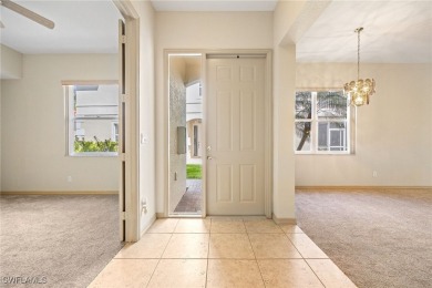 Maintenance-Free Living in Prime Naples Location - First Floor on Glen Eagle Golf and Country Club in Florida - for sale on GolfHomes.com, golf home, golf lot