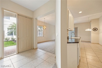 Maintenance-Free Living in Prime Naples Location - First Floor on Glen Eagle Golf and Country Club in Florida - for sale on GolfHomes.com, golf home, golf lot