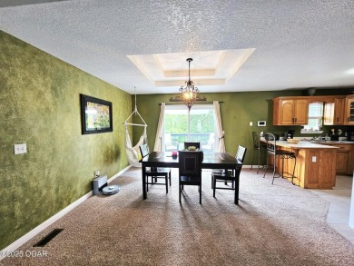 Charming 3-Bedroom, 2-Bath in Desirable Cedar Ridge - Carl on Twin Hills Golf and Country Club in Missouri - for sale on GolfHomes.com, golf home, golf lot