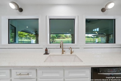 This stunning newly remodeled California style modern home sits on Fair Oaks Ranch Golf and Country Club in Texas - for sale on GolfHomes.com, golf home, golf lot