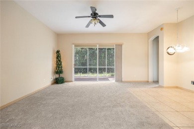 Maintenance-Free Living in Prime Naples Location - First Floor on Glen Eagle Golf and Country Club in Florida - for sale on GolfHomes.com, golf home, golf lot