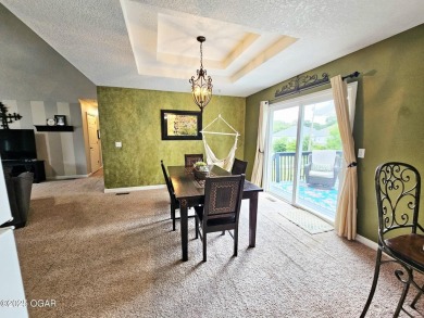 Charming 3-Bedroom, 2-Bath in Desirable Cedar Ridge - Carl on Twin Hills Golf and Country Club in Missouri - for sale on GolfHomes.com, golf home, golf lot