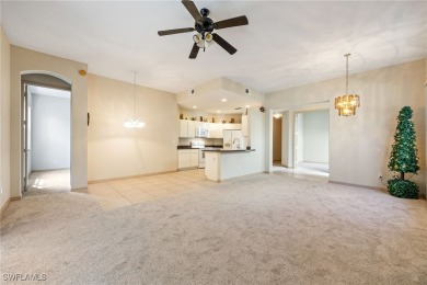 Maintenance-Free Living in Prime Naples Location - First Floor on Glen Eagle Golf and Country Club in Florida - for sale on GolfHomes.com, golf home, golf lot