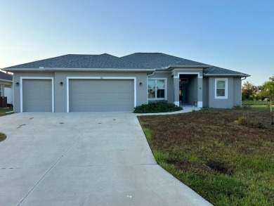 As you enter this 3 bedroom,  2 &1/2 bath, 3 car garage, canal on Rotonda Golf and Country Club - Long Marsh  in Florida - for sale on GolfHomes.com, golf home, golf lot