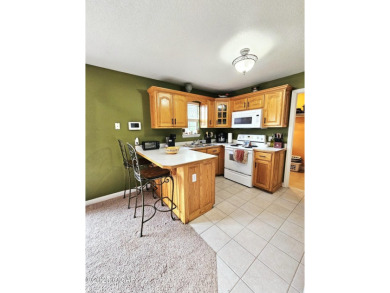 Charming 3-Bedroom, 2-Bath in Desirable Cedar Ridge - Carl on Twin Hills Golf and Country Club in Missouri - for sale on GolfHomes.com, golf home, golf lot