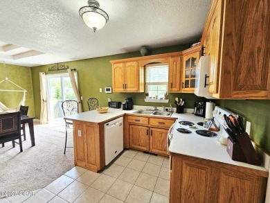 Charming 3-Bedroom, 2-Bath in Desirable Cedar Ridge - Carl on Twin Hills Golf and Country Club in Missouri - for sale on GolfHomes.com, golf home, golf lot
